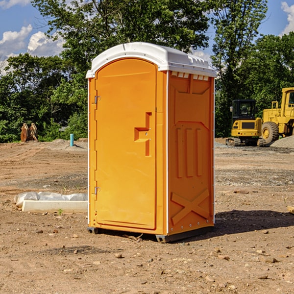 how often are the porta potties cleaned and serviced during a rental period in Six Lakes MI